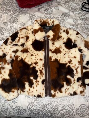 Woman’s cow print furry jacket zip up